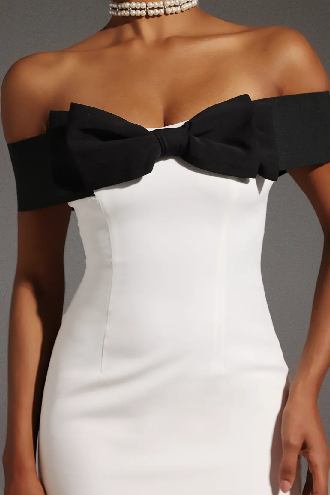 Devere Off-Shoulder Bow Tie Mini Dress
