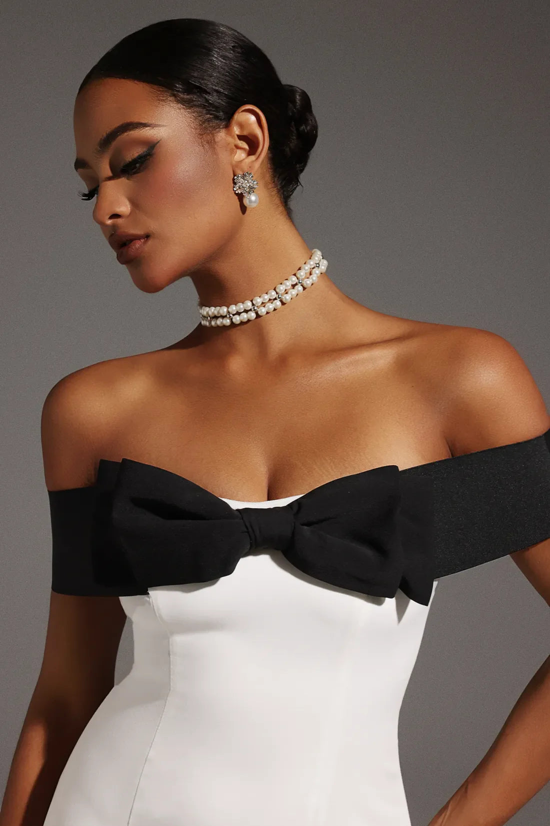 Devere Off-Shoulder Bow Tie Mini Dress