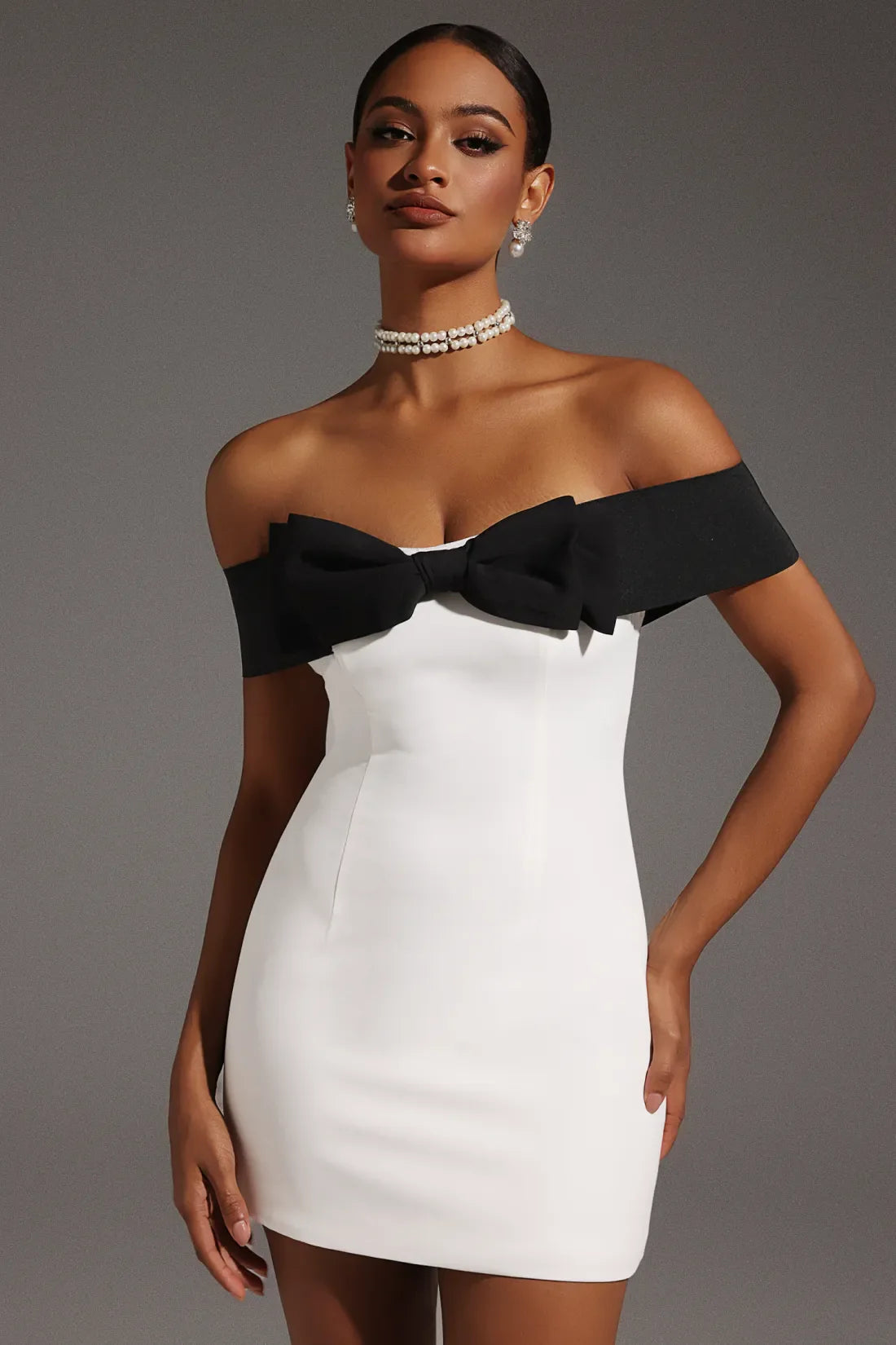 Devere Off-Shoulder Bow Tie Mini Dress